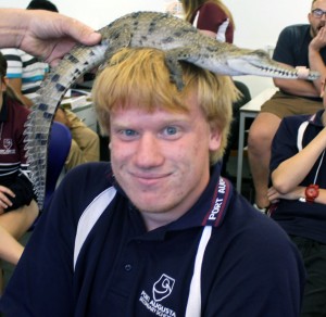 Dylan with croc on head