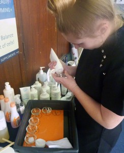 Serina setting up a tray for facial